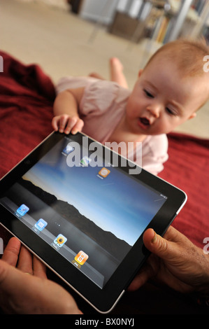 Baby with Ipad Stock Photo