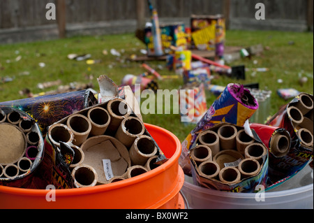 Day after backyard fireworks display July 4th clean up the garbage Stock Photo