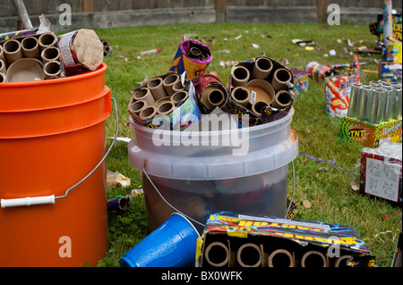 Day after backyard fireworks display July 4th clean up the garbage Stock Photo