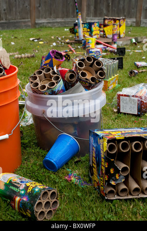 Day after backyard fireworks display July 4th clean up the garbage Stock Photo