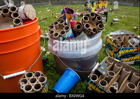 Day after backyard fireworks display July 4th clean up the garbage Stock Photo