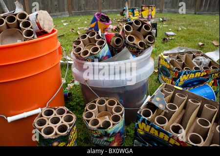 Day after backyard fireworks dsiplay July 4th clean up the garbage Stock Photo