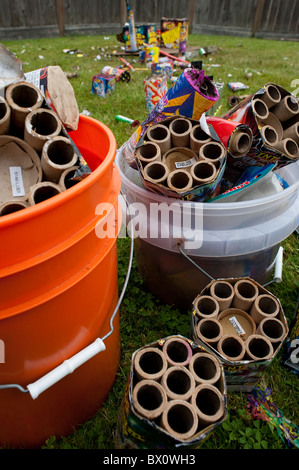 Day after backyard fireworks display July 4th clean up the garbage Stock Photo