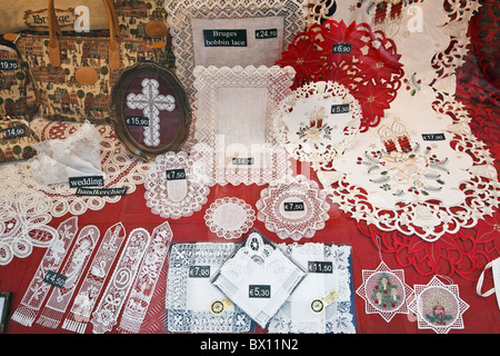 Bruges, East Flanders, Belgium, Europe. Shop selling Belgian lace souvenirs displayed in the window Stock Photo