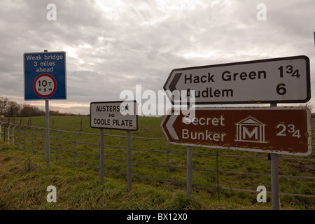 Uk direction road signs to small villages and a Secret Bunker near Nantwich, Cheshire Stock Photo