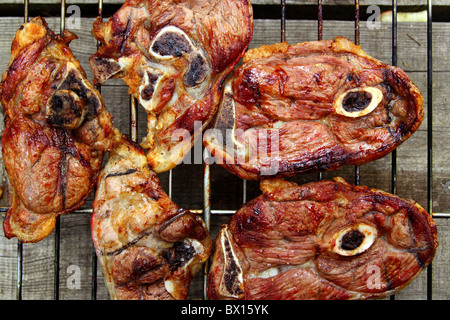 barbecue lamb meat grill on wooden table grilled food Stock Photo