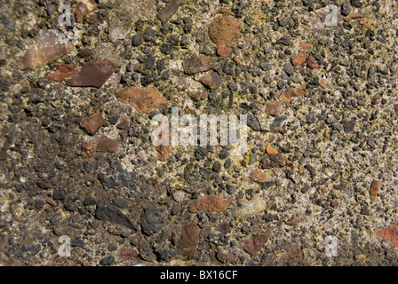 Close up on Pebble and Concrete Wall, Background Stock Photo