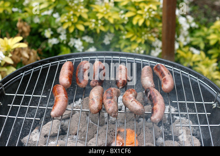 Sausages on the Barbecue in the garden Stock Photo