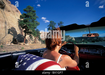 1962 Pink Cadillac Convertible woman driving car vintage car tattoo Fully Released New Mexico Route 66 USA Stock Photo