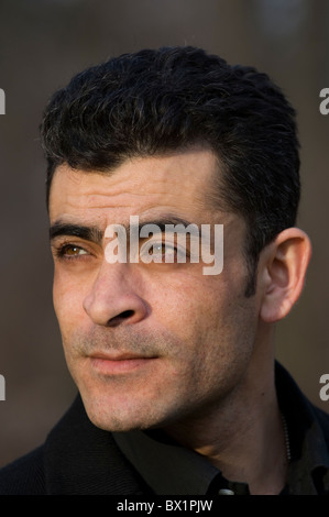 Portrait of an ethnic man looking away in Berlin Germany Stock Photo