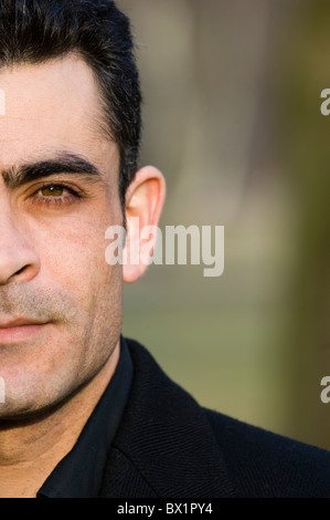 Closeup portrait of serious 35 years old Middle Eastern man Berlin Germany Stock Photo