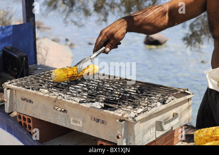 Street food in Santorini - grilled corn Stock Photo
