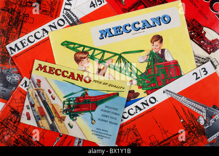 Meccano instruction and accesory outfit booklets used to build working models and mechanical devices invented by Frank Hornby Stock Photo