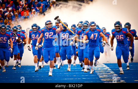 Idaho, Boise, Boise State University football team entering football stadium before start of game. Stock Photo