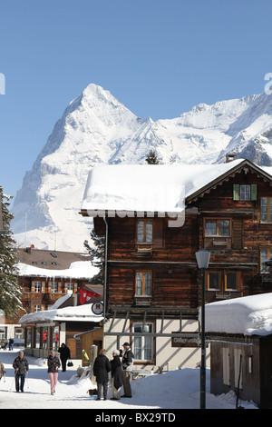 Murren, Switzerland - Main Street through the town with a stunning view of the Eiger mountain Stock Photo