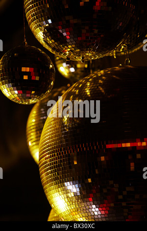 Vertical image of disco balls sparkling in darkness Stock Photo