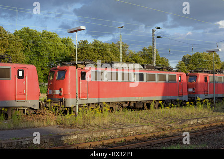 Disused electric locomotives waiting to be scrapped, Opladen, Germany. Stock Photo