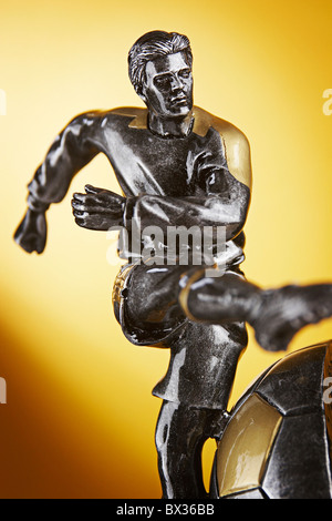 Close up of footballer trophy. Stock Photo