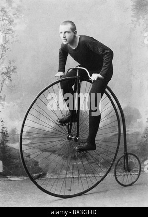 Vintage portrait photo circa 1891 of World Champion cyclist William Walker Martin on a penny-farthing bicycle. Stock Photo