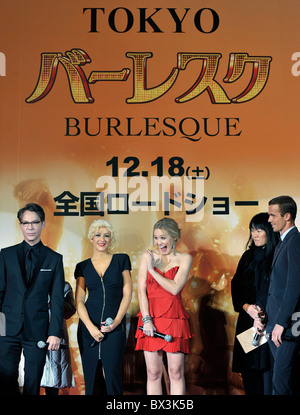 Singer and actress Christina Aguilera (2L) attends a red carpet event in Tokyo to promote the film Burlesque Stock Photo