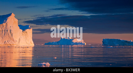 Icebergs, admitted onto UNESCO’s World Heritage List, at sunset, Kangia icefjord, Disko-Bay, West-Greenland, Greenland Stock Photo