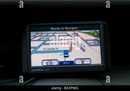 GPS navigation device being used in a car. Stock Photo