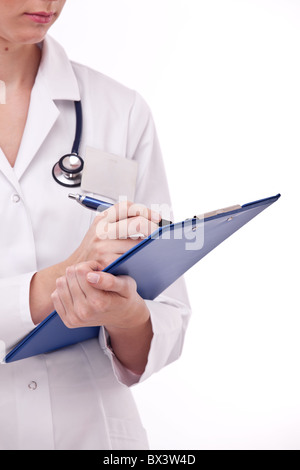 Doctor completing on medical card. Isolated on a white. Stock Photo