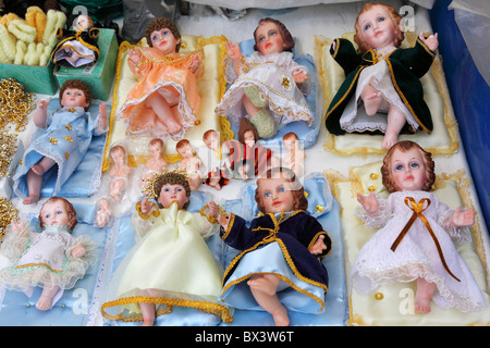 Baby Jesus figures (called Niños in Spanish) for nativity scenes on sale in Christmas market , La Paz , Bolivia Stock Photo