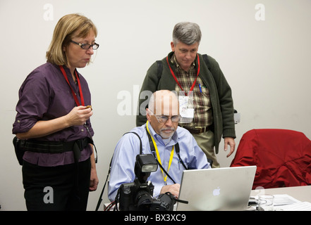 News Photographers Edit and File Pictures Stock Photo