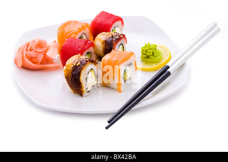 Image of maki sushi rolls served with wasabi and pickled ginger Stock Photo