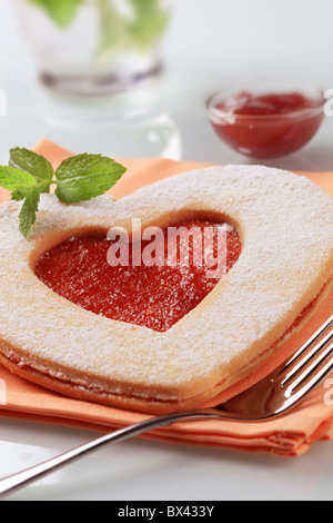 Heart shaped Linzer biscuit with jam filling Stock Photo