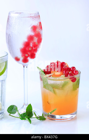 Iced drinks garnished with fresh fruit Stock Photo