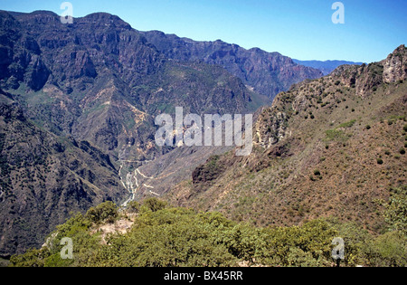 The Copper Canyon in Sierra Madre, Chihuahua State, Mexico, South America - with a road winding down the valley Stock Photo