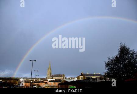 View of a rainbow over the city after a rain storm City of Derry from Bogside, Northern Ireland Stock Photo