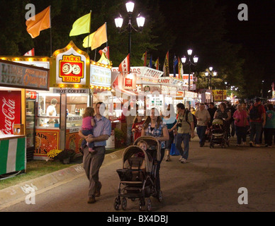 Crowds of people enjoy an evening at the North Carolina State Fair, Raleigh NC Stock Photo