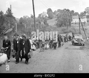 Sudeten Germans on their way to a railway station in Liberec in former Czechoslovakia to be transfered to Germany in July 1946. Stock Photo