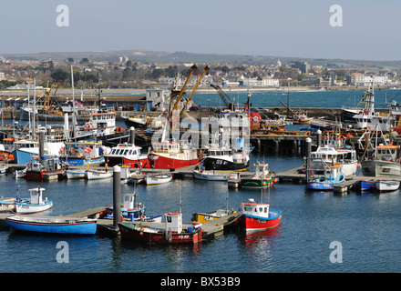 trawlers and fishing boats in port at Newlyn, Cornwall, UK Stock Photo