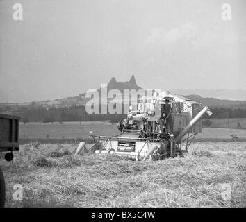 wheat harvest, United Agricultural Cooperative, harvest machine, Trosky Castle Stock Photo