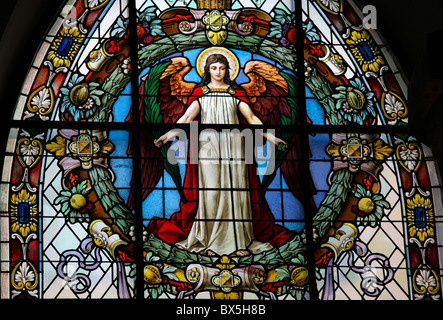 Stained glass window depicting an Angel. Stock Photo