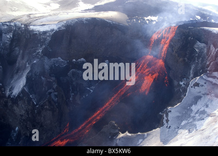 Lava flowing down mountain from Eyjafjallajokull volcano, Iceland, Polar Regions Stock Photo