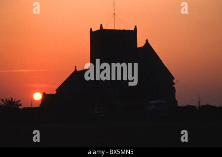 Sunset behind St Michael's Church, Oulton Broad, Suffolk Stock Photo