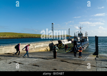 dh  EGILSAY ORKNEY Tourist visitors catching Egilsay Rousay ferry travel passengers scottish people scotland boat loading
