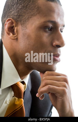 Thinking specialist touching his chin over white background Stock Photo