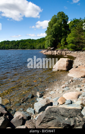 The beautiful Loch Katrine, part of the loch Lomond and Trossachs national park, district of Stirling, Scotland taken summer The beautiful Loch Katrine, part of the loch Lomond and Trossachs national park, district of Stirling, Scotland taken summer