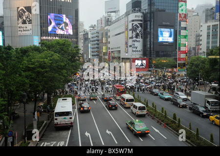 Shibuya Crossing on a rainy day seen from above through a window, Tokyo, Japan Stock Photo
