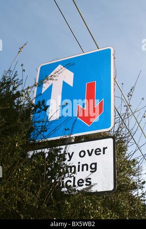 Priority over oncoming vehicles road sign in Chenies Buckinghamshire UK Stock Photo