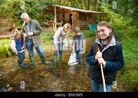 Grandparents and grandchildren exploring Stock Photo