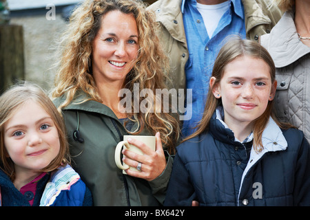 Family drinking tea on the farm Stock Photo