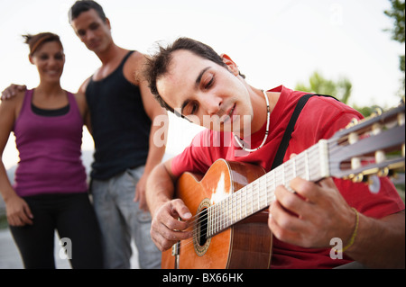 Man playing guitar Stock Photo