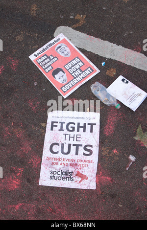 Posters litter the floor as students protest against rise in tuition fess in central London. Stock Photo